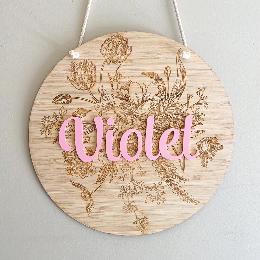 round bamboo name plaque with engraved pattern