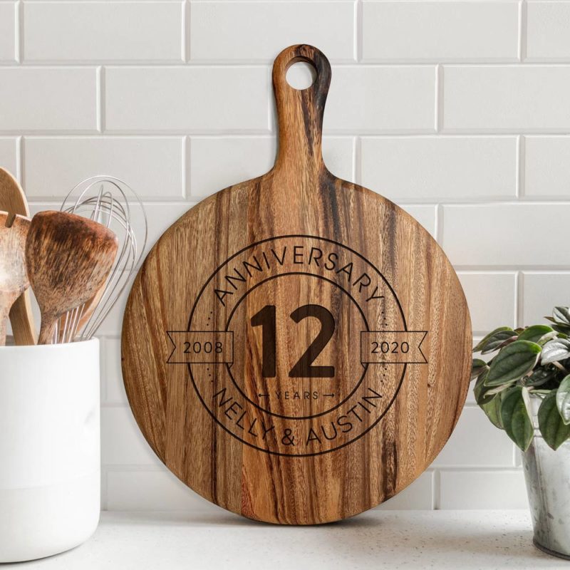 round paddle serving board anniversary